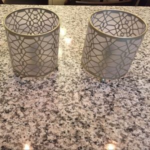 Pair of bedside lamps/lights or mood lighting.