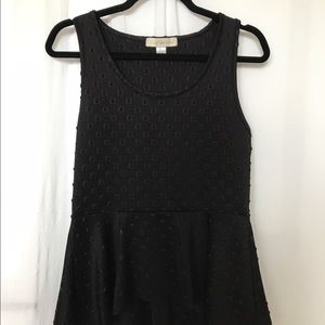 Black sleeveless peplum top