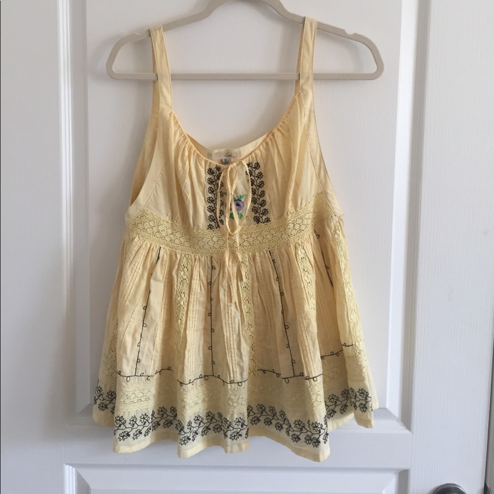 Yellow top.