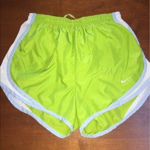 Green Nike running shorts