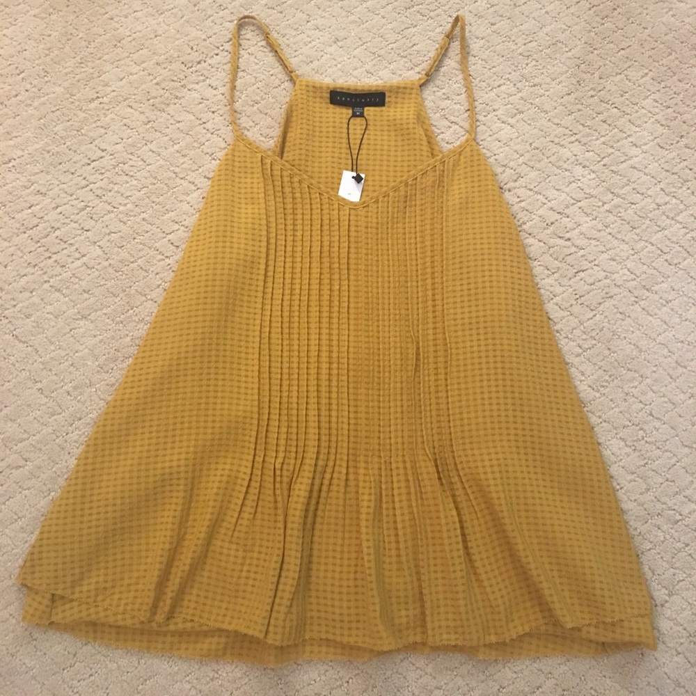 Sanctuary yellow tank.