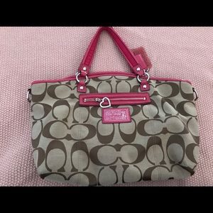 Authentic Coach purse with pink trim