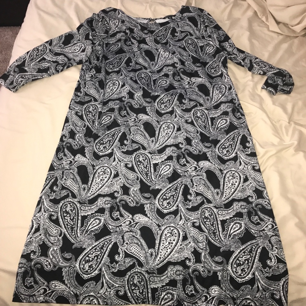 Knew length dress.
