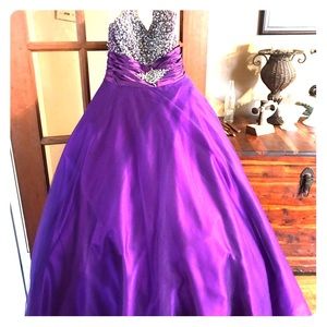 Purple and crystal ball gown pageant dress.
