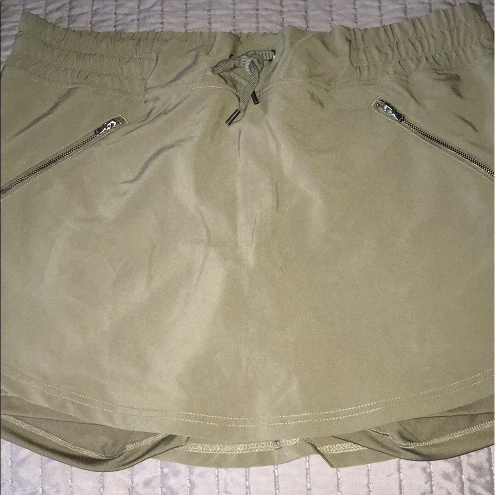 Army green athletic skort.