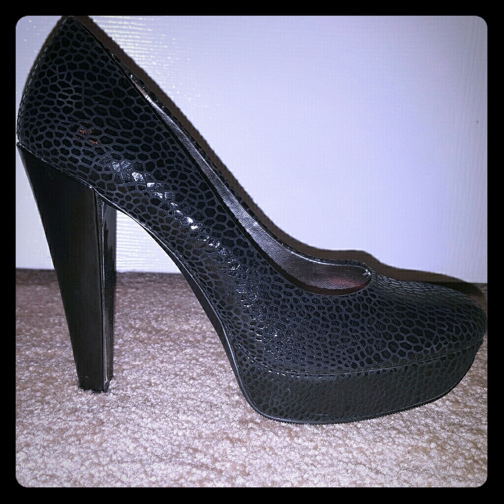 Black Calvin Klein pumps