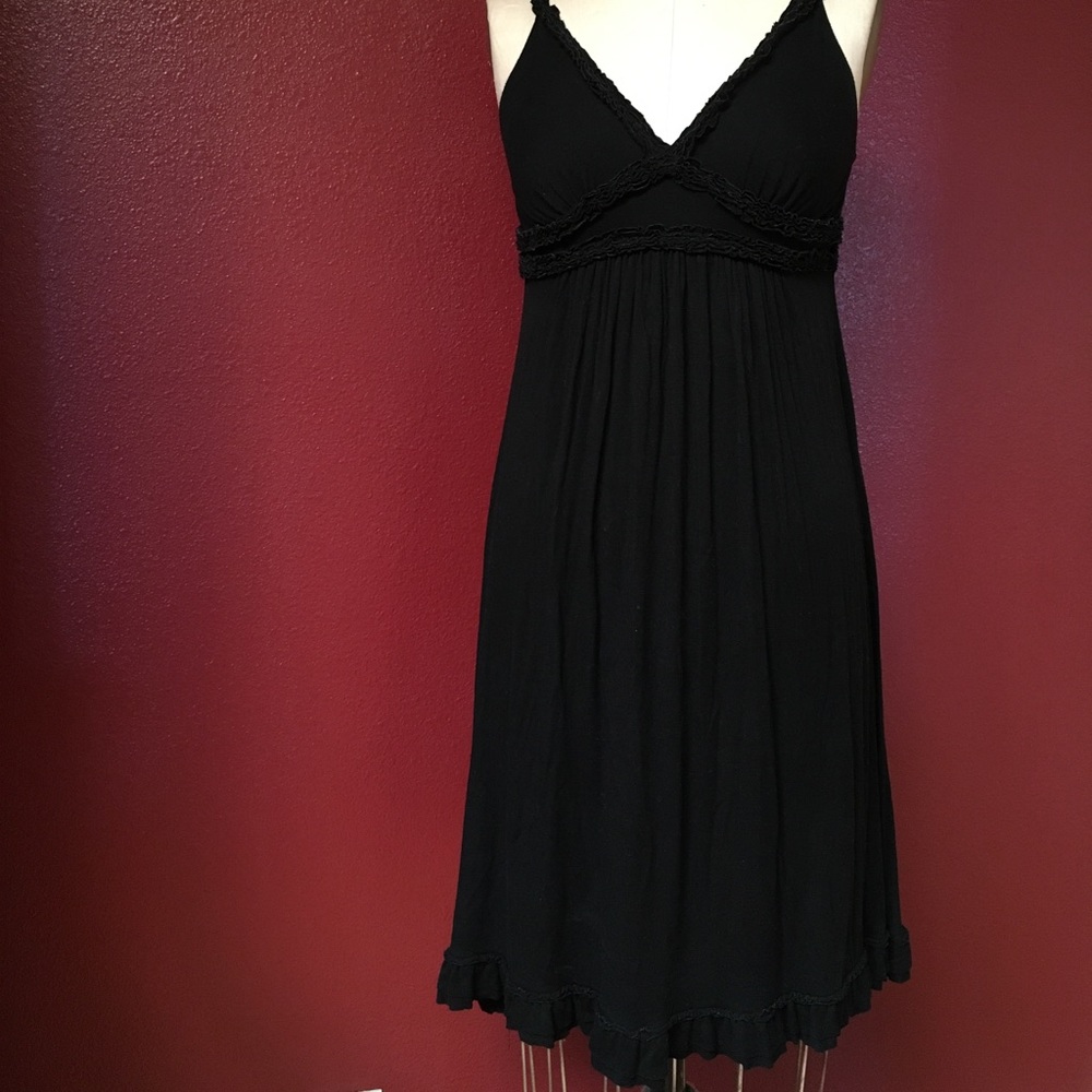 Medium length black dress