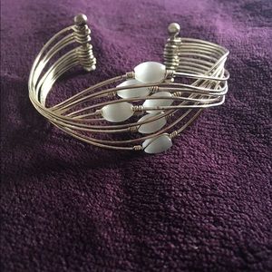 Wrapped metal bracelet with opaque gem-like beads