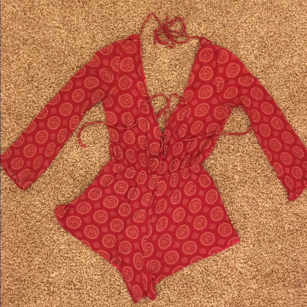 Xenia Boutique open back romper!