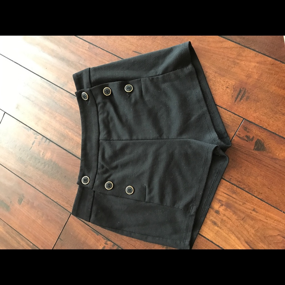 Shorts with gold buttons