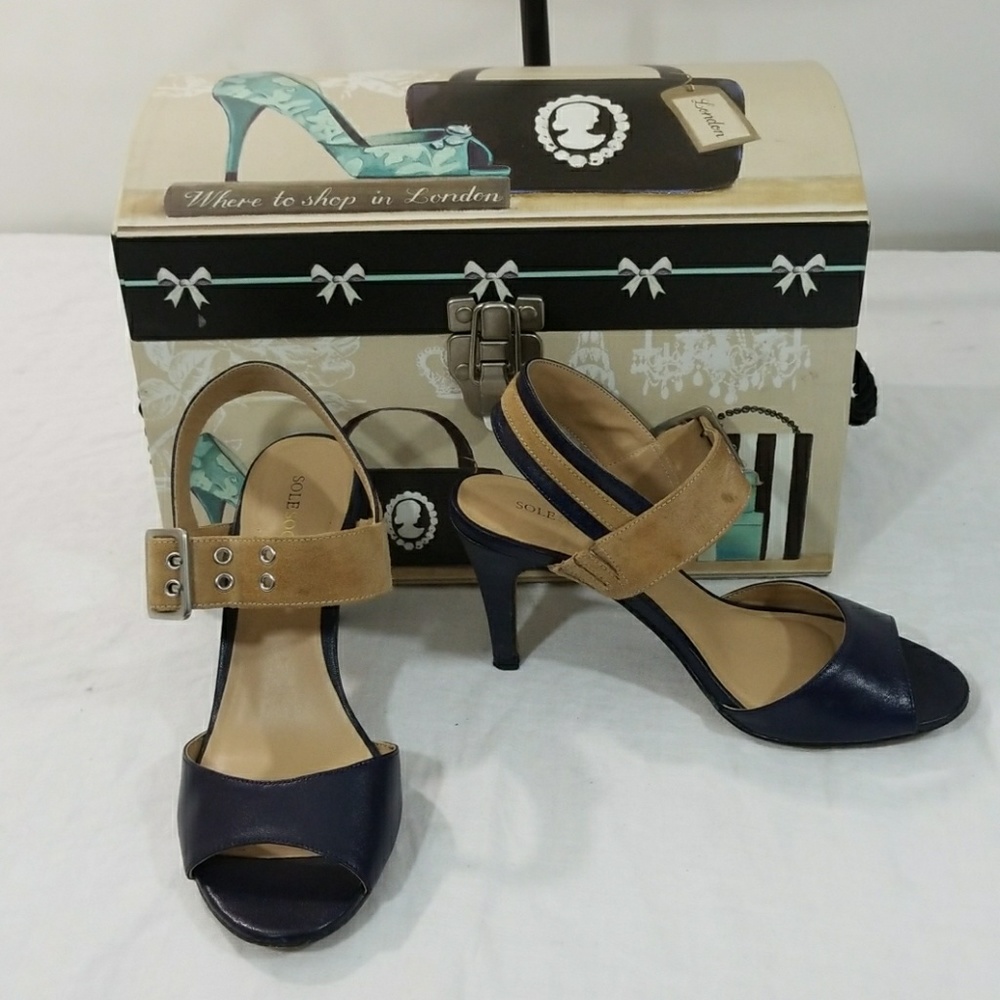 Navy blue and tan heels