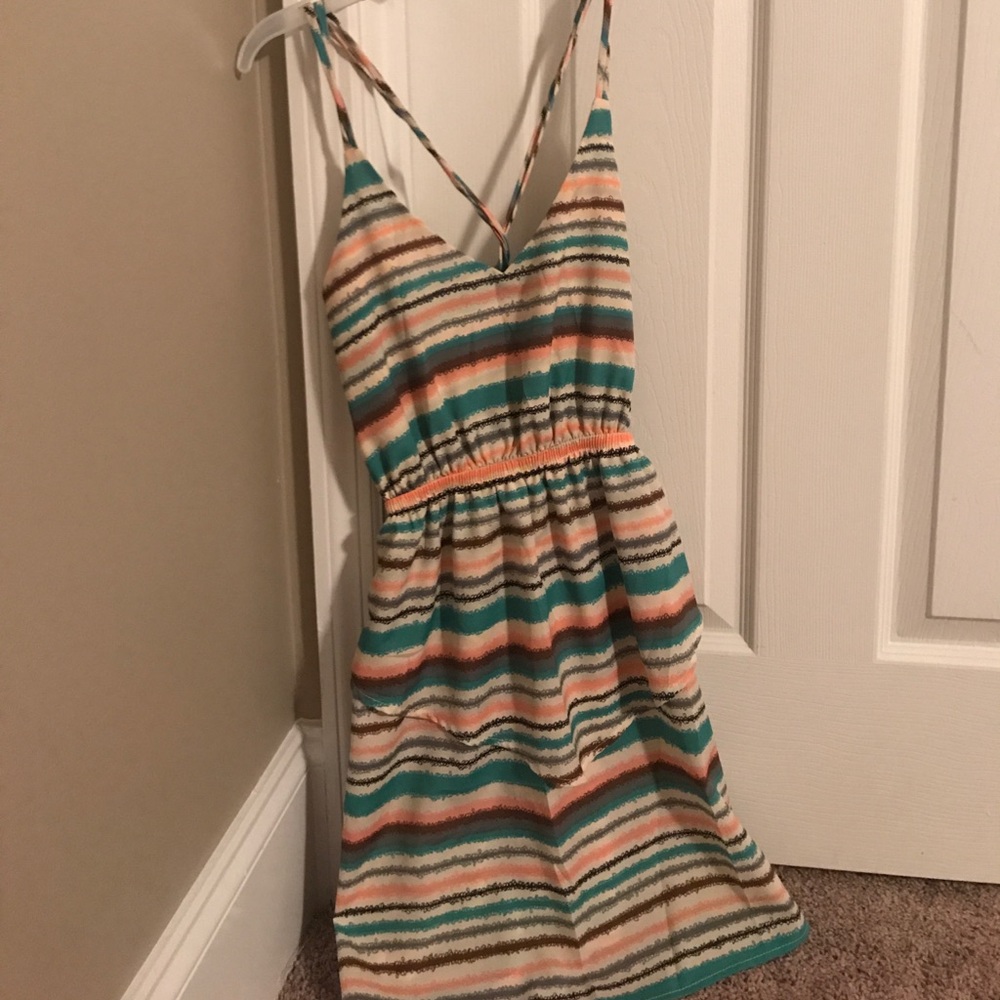 Criss cross back, fitted boutique brand dress