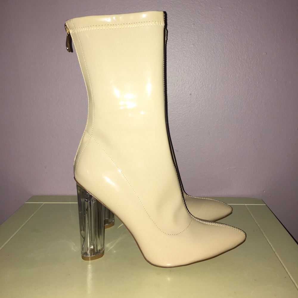 Nude patent style clear heel boots size 7