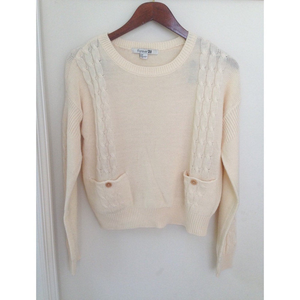 Buttoned cable knit sweater