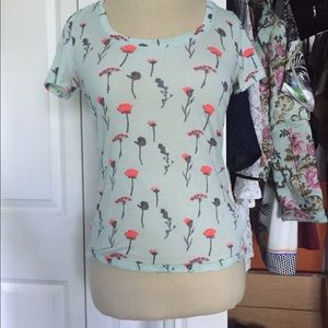 Tight fitted shirt with floral pattern