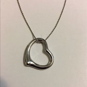 Sterling silver necklace with heart/bean pendant