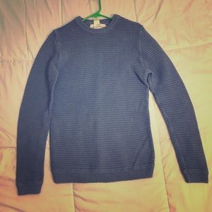 A heavy weight textured sweater in a baby blue