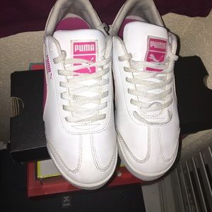 Pink and white Puma