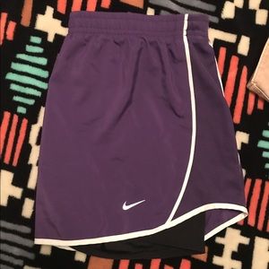 Purple Nike shorts