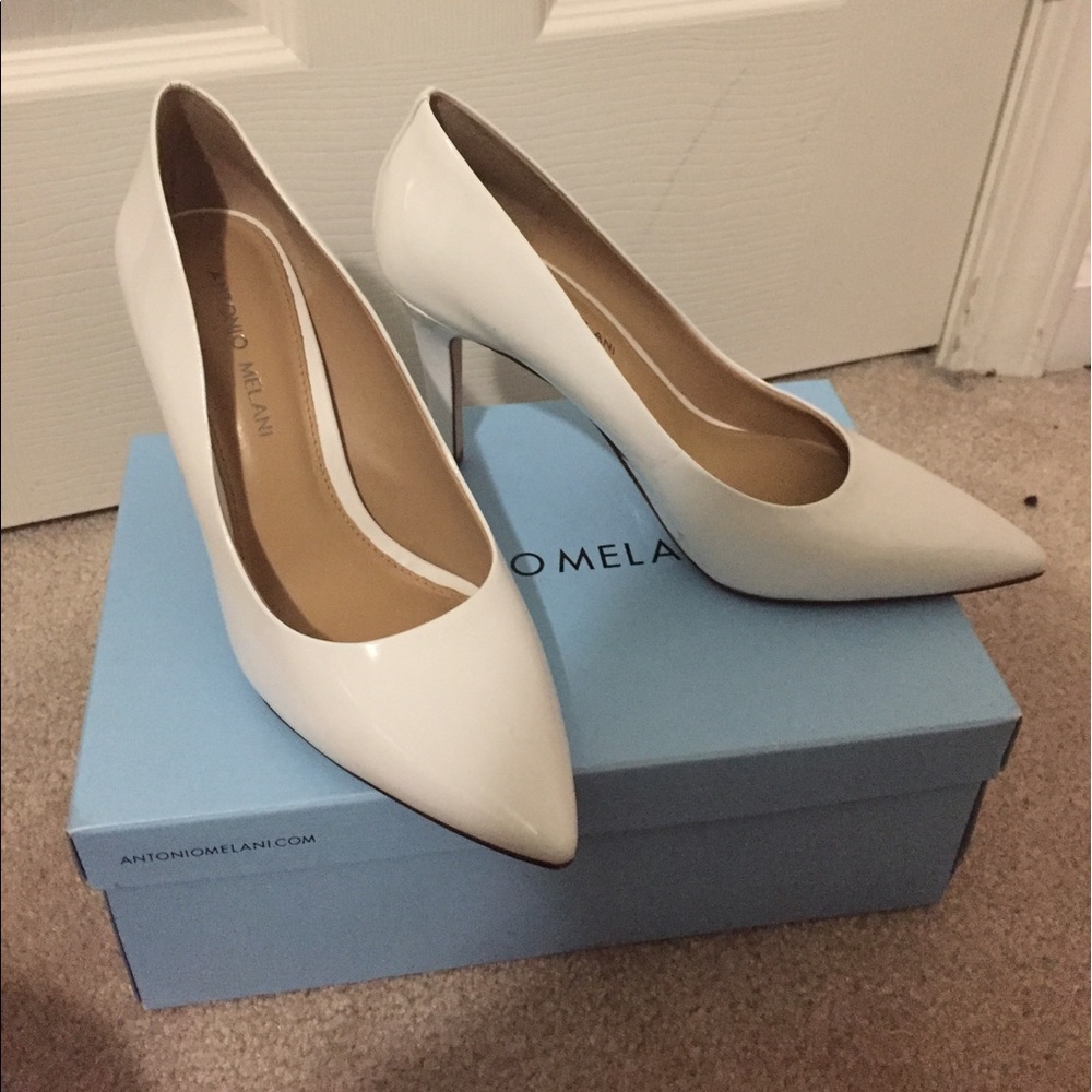 Brand new with box white heels!