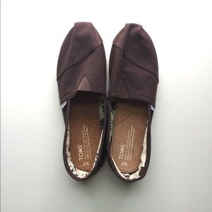 TOMS classic slip-on shoes in dark brown.