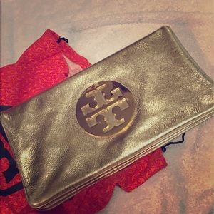 Tory Burch gold clutch