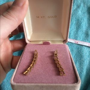 14k gold earrings new in box.