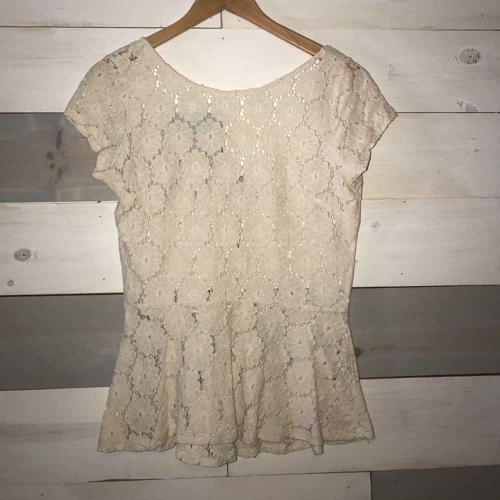Sheer lace peplum top