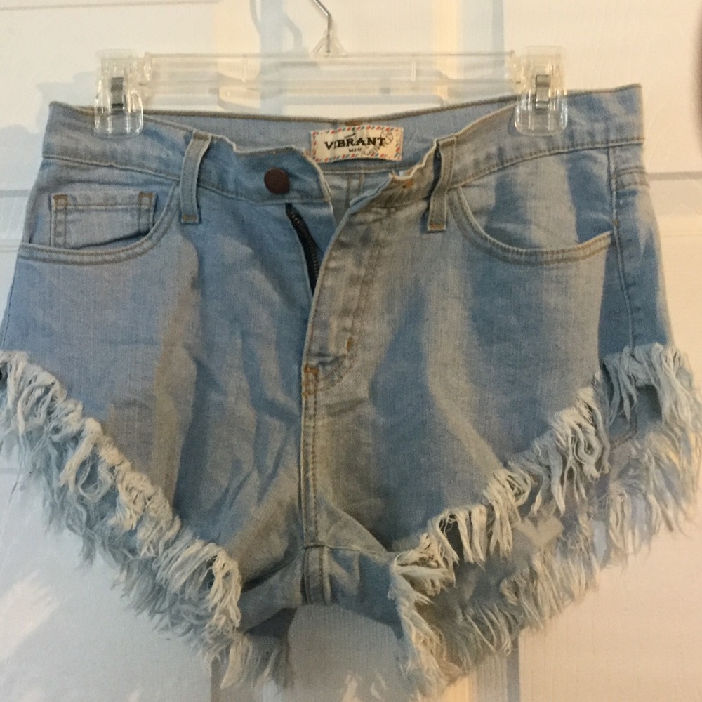 Blue jean shorts with fringe