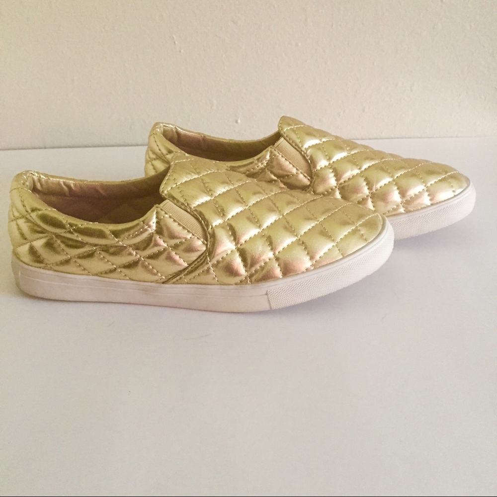 Gold slip on sneakers