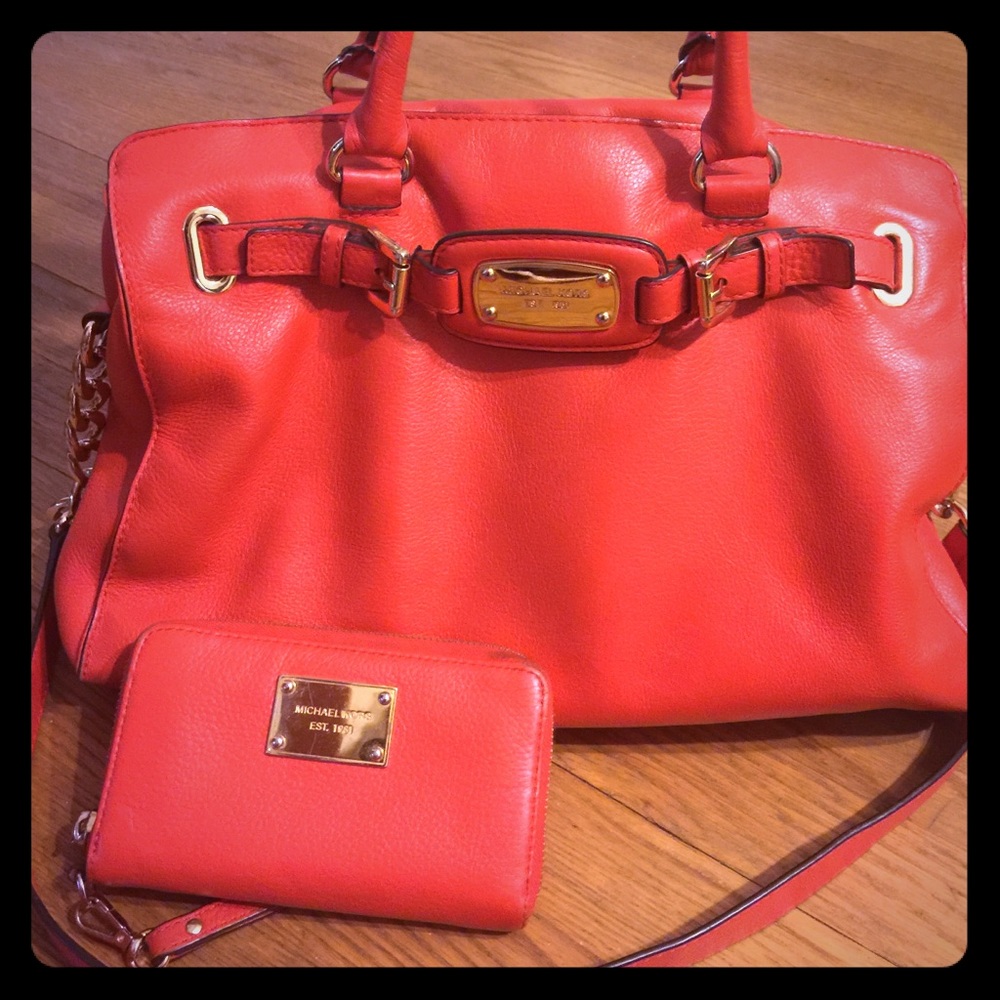 Orange MK purse with matching wallet