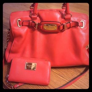 Orange MK purse with matching wallet
