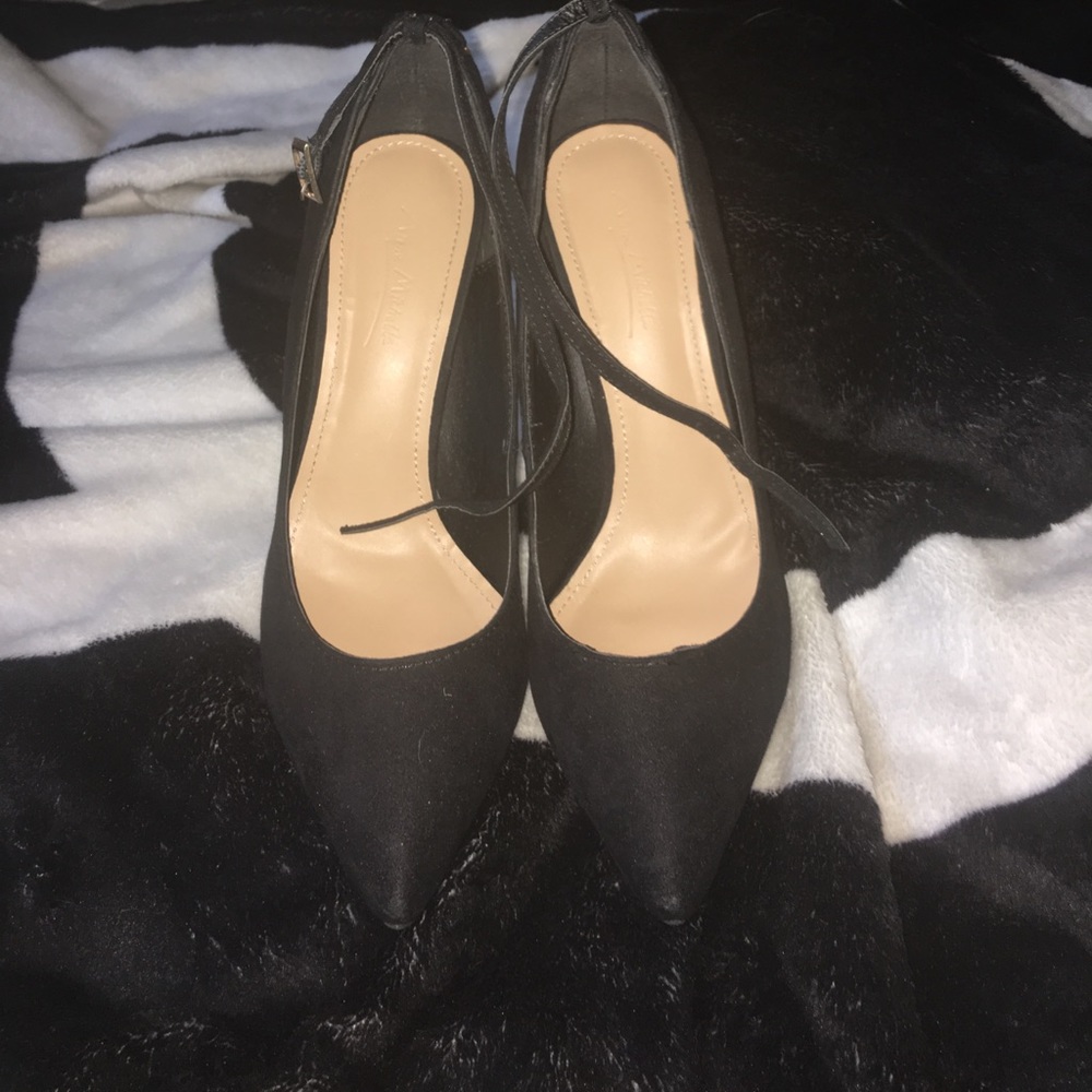 Black heels with strap.