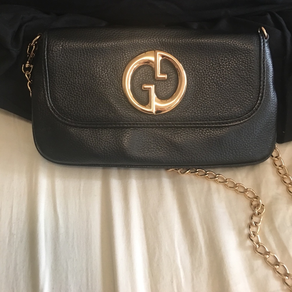 Gucci crossbody/ clutch with GG hardware