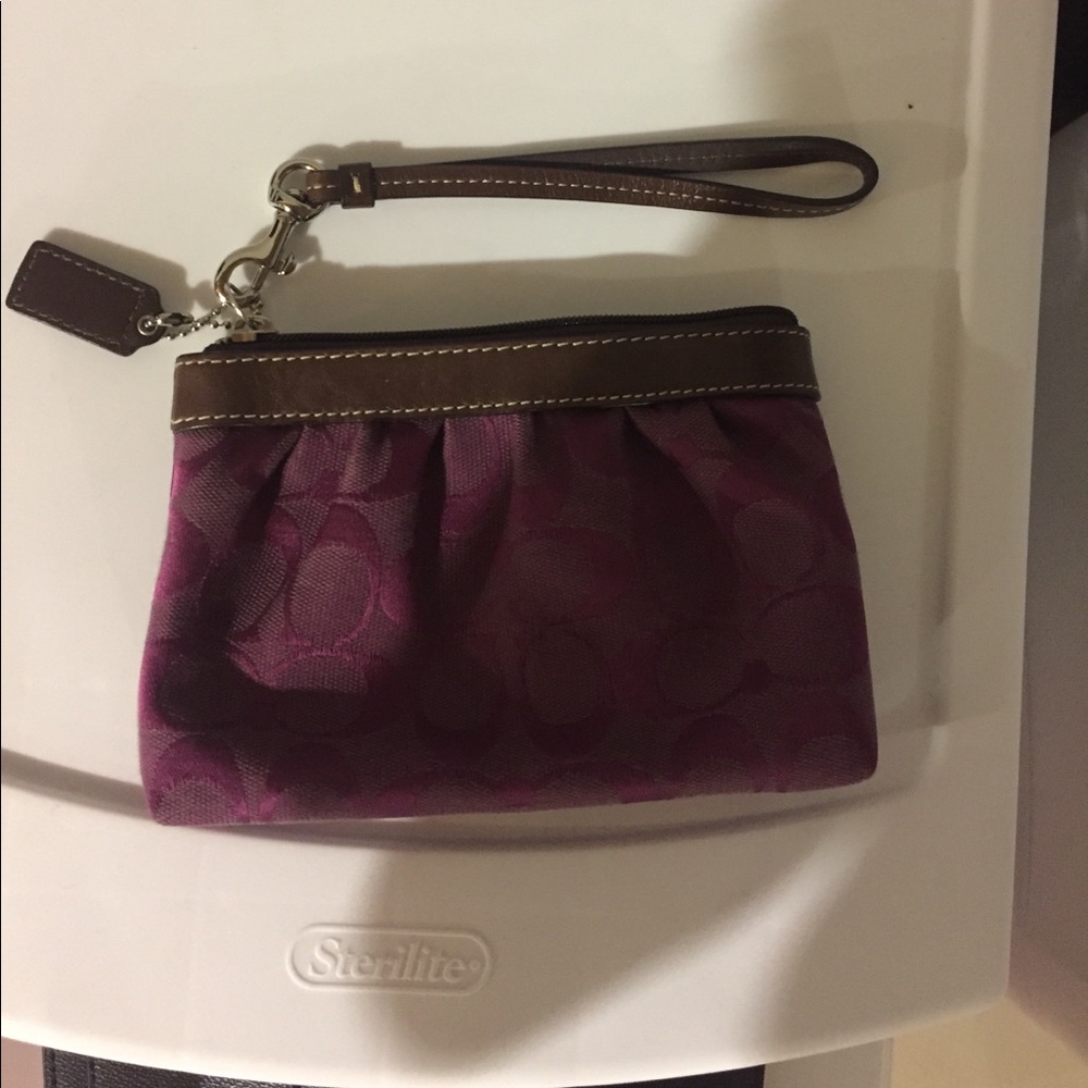 Purple Coach wristlet