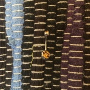 Orange belly button ring