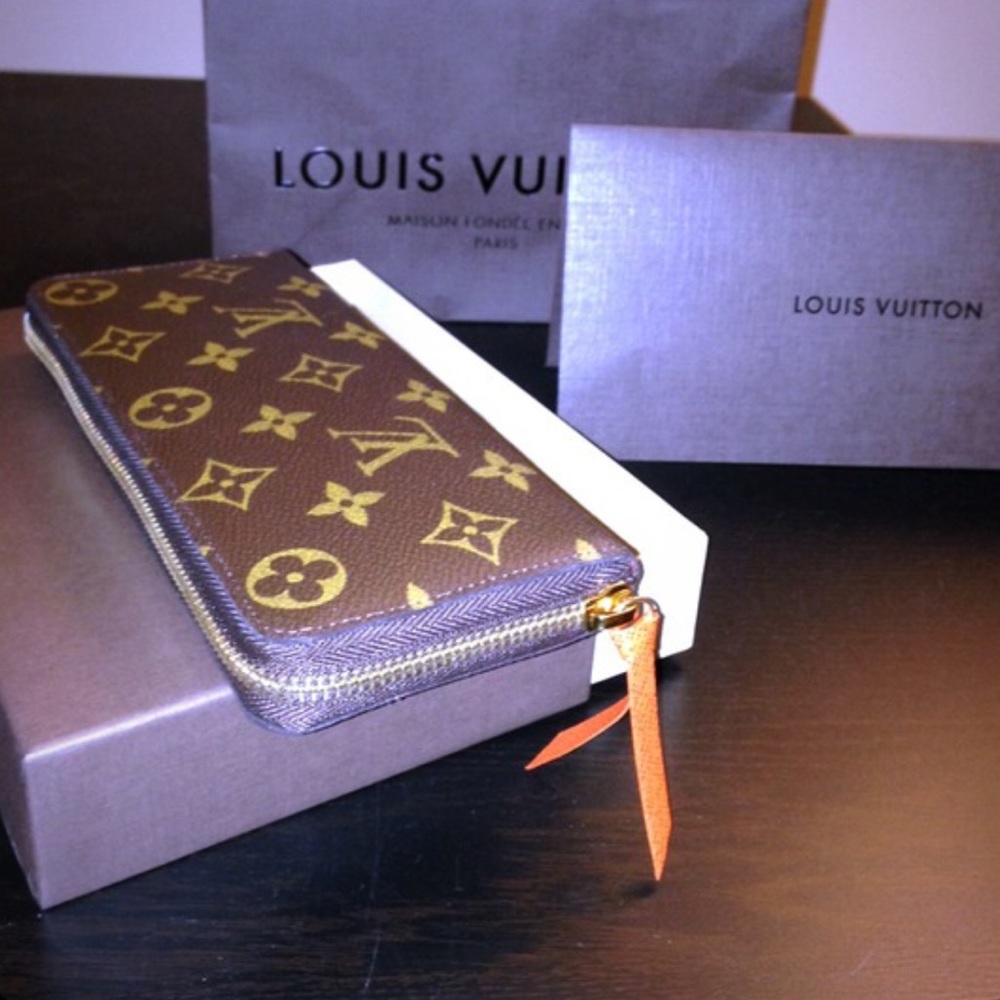 Louis Vuitton Clemence zip wallet in orange