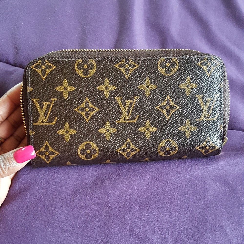 Large double zippy wallet.  Never used.