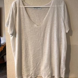 Distressed cream v neck top