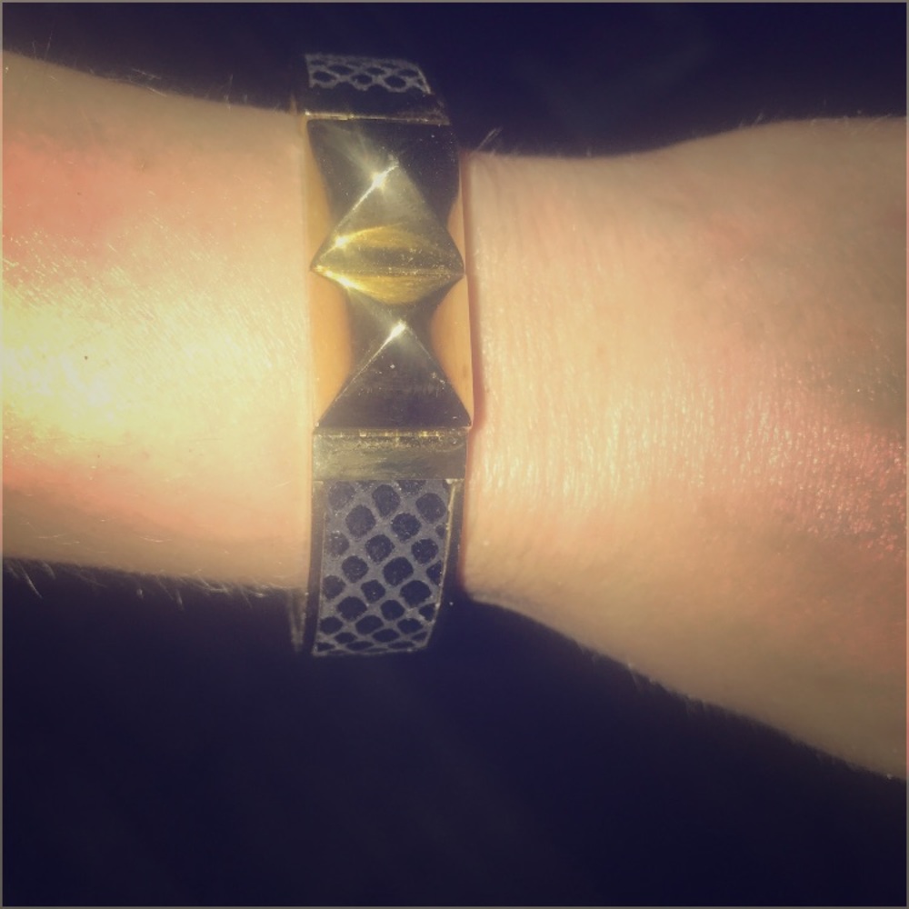 MK embossed bangle with gold hardware