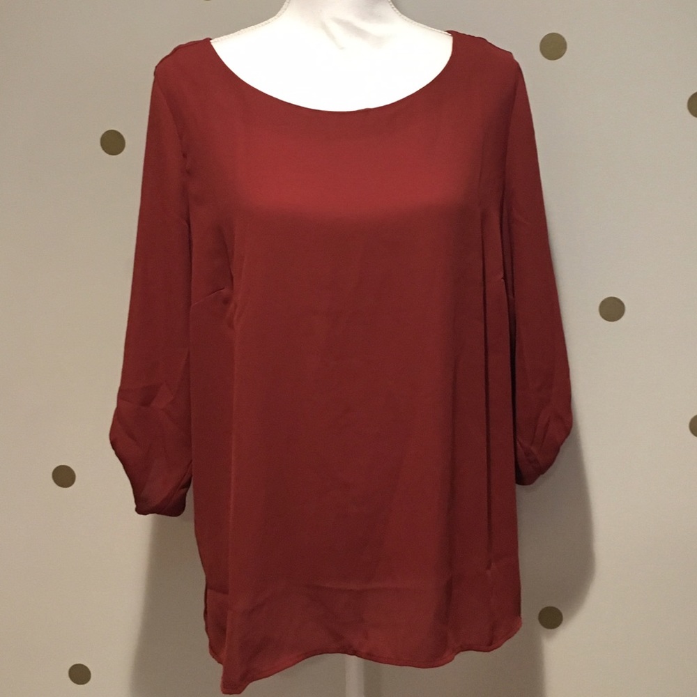 Flowy top with exposed zipper