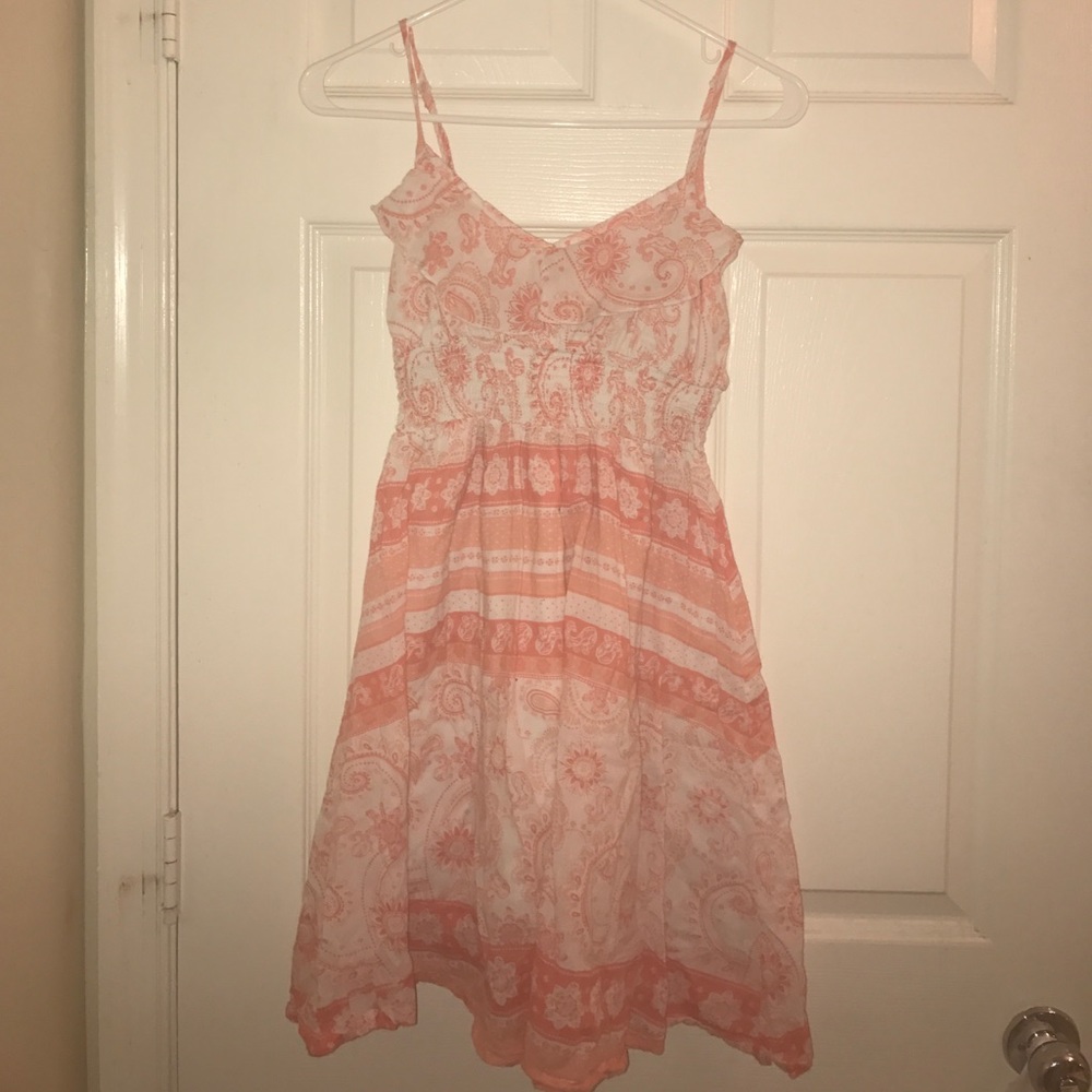 A orange and white sun dress