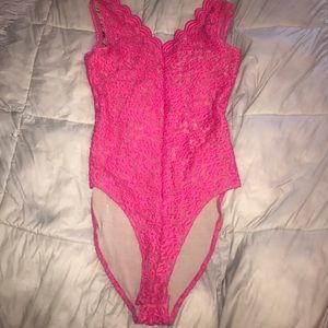 Never worn, hot pink lace leotard.