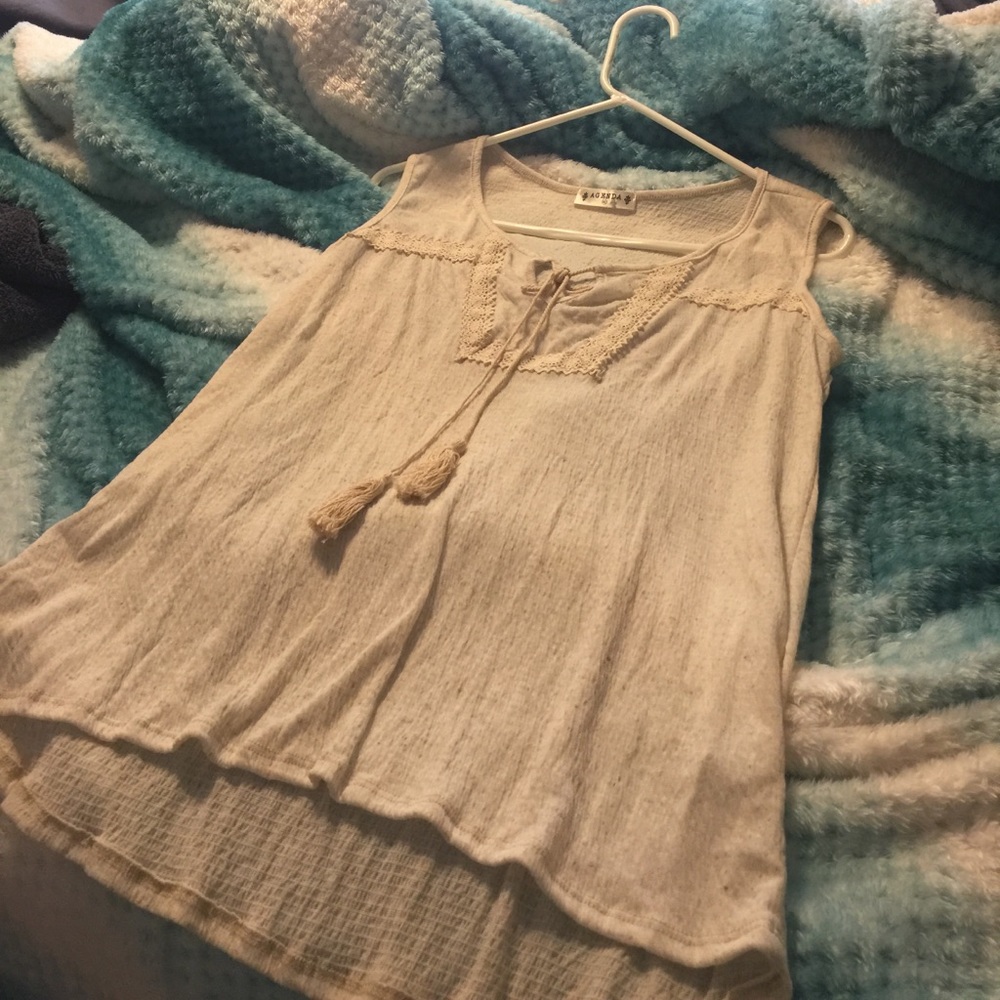 Cream shirt.