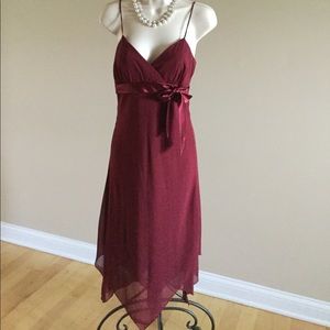 Burgundy cocktail dress with bow detail