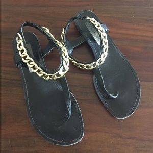 Black sandals with chain detailing