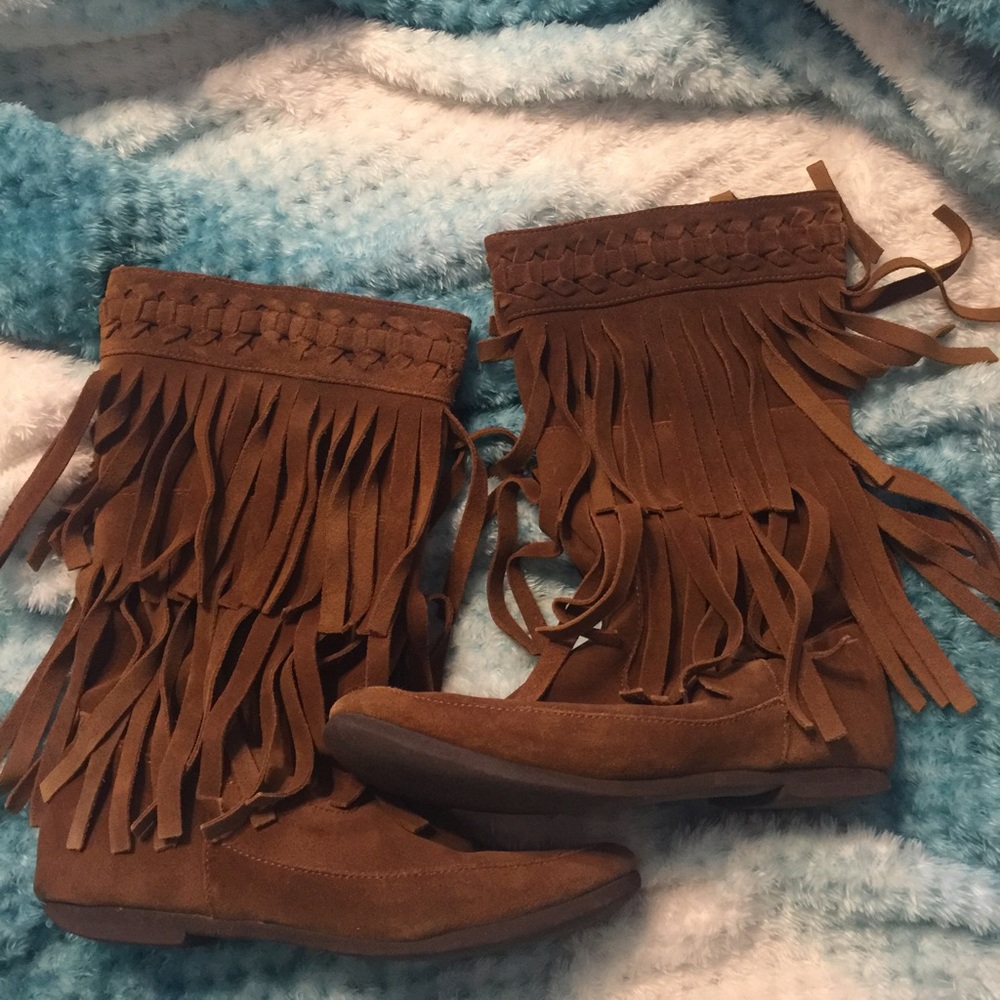 Two-tier leather moccasin boots.
