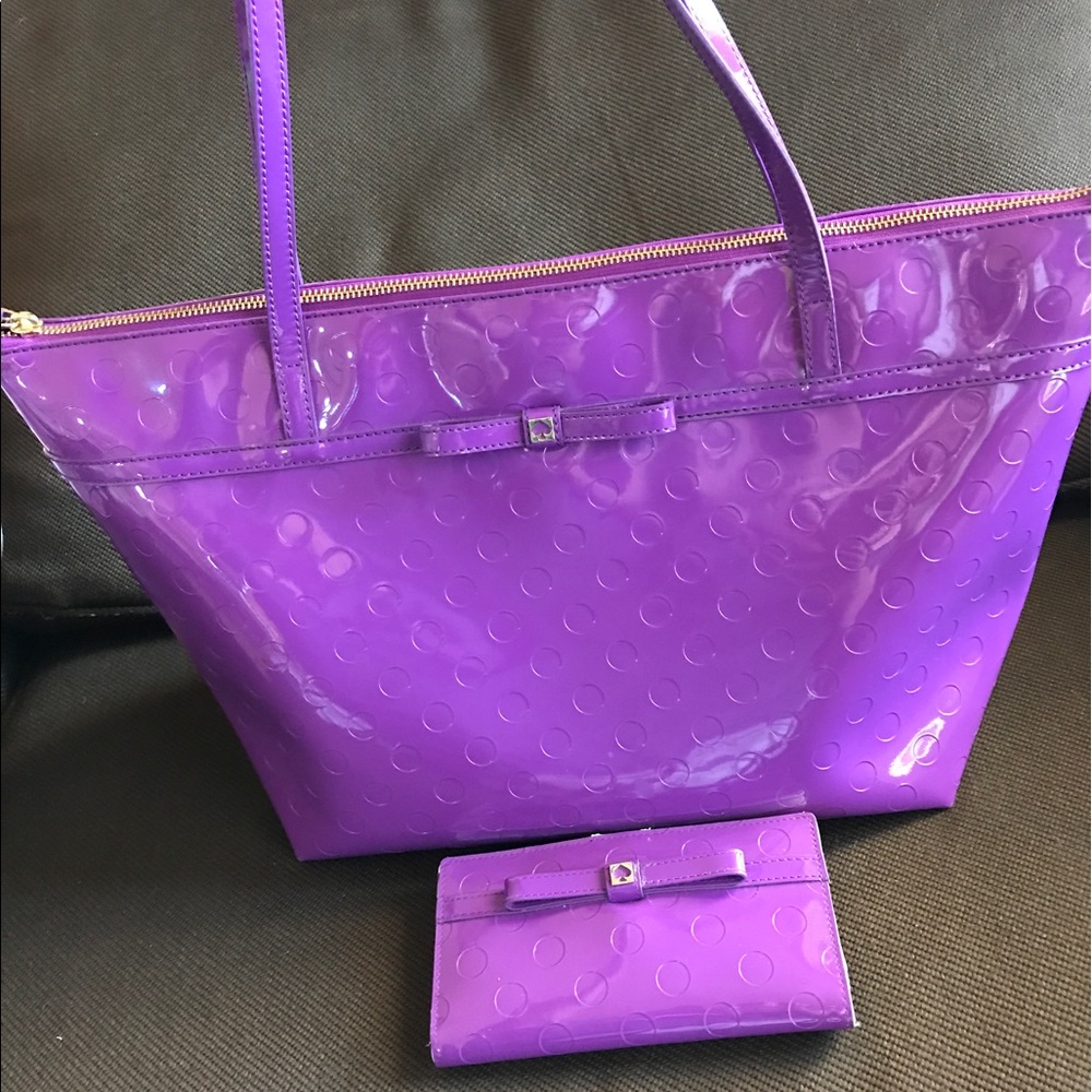 Authentic 💯 purple handbag wallet is not included