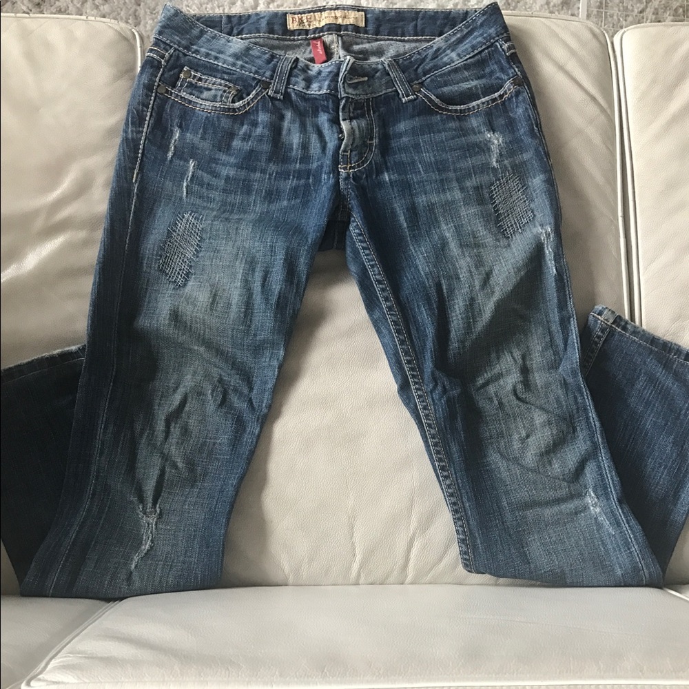 Buckle Skinny Jeans