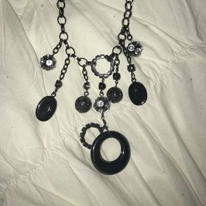 Silver and black buckle necklace